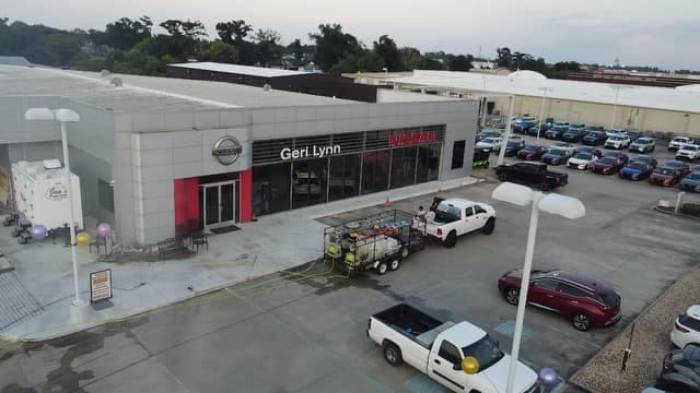 Aerial view of car dealership cleaning