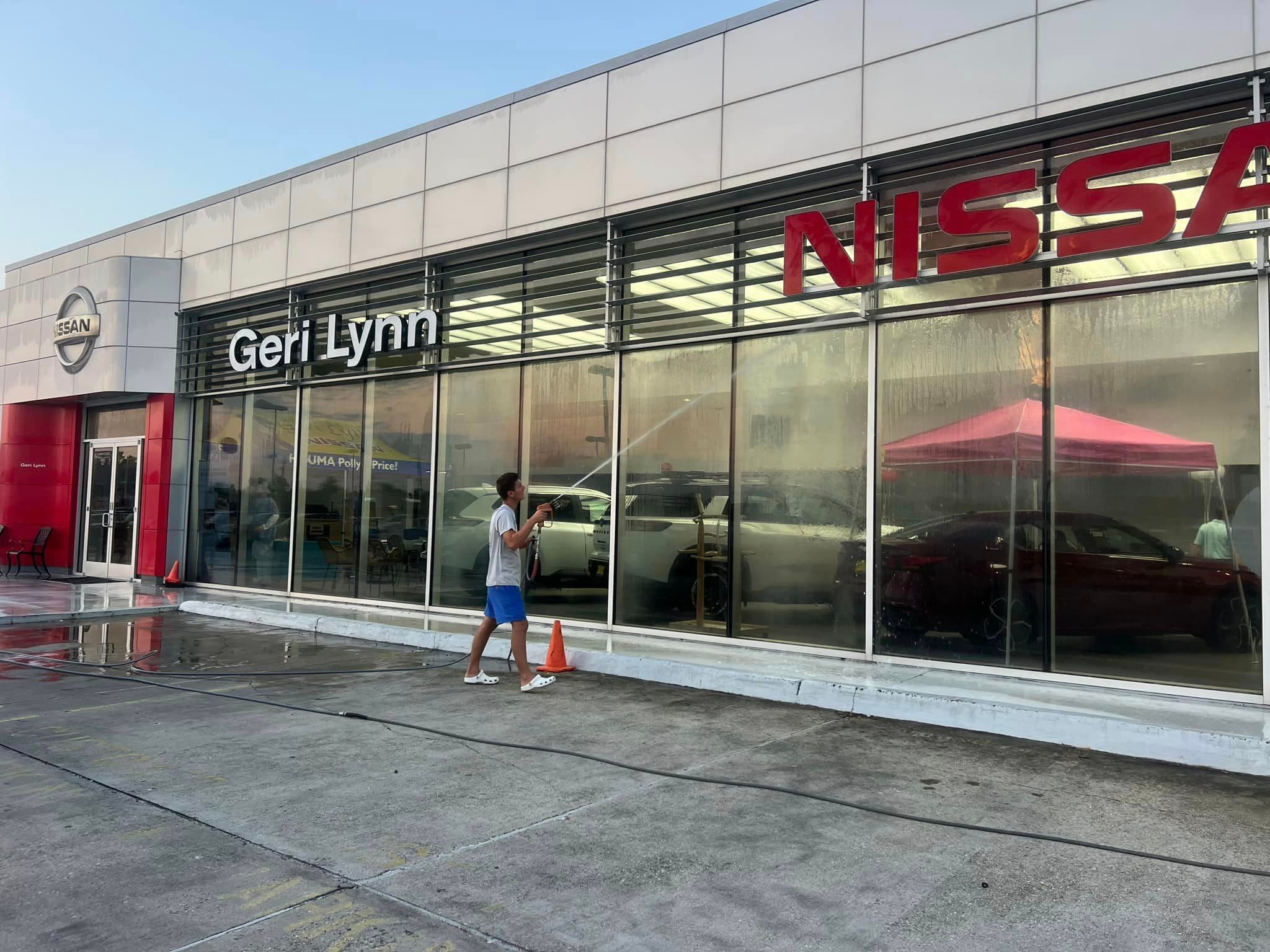 Car dealership washing in progress